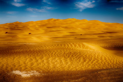 Scenic view of desert against sky