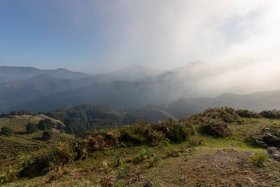 Scenic view of mountains against sky