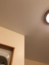 Close-up of illuminated lamp at home