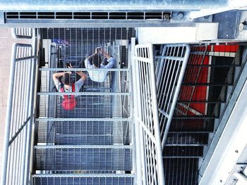 High angle view of people standing at balcony