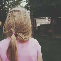 Rear view of girl with long blond hair