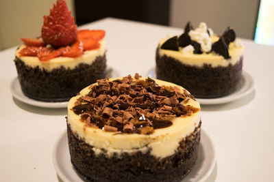 Close-up of served chocolate cheesecake on table