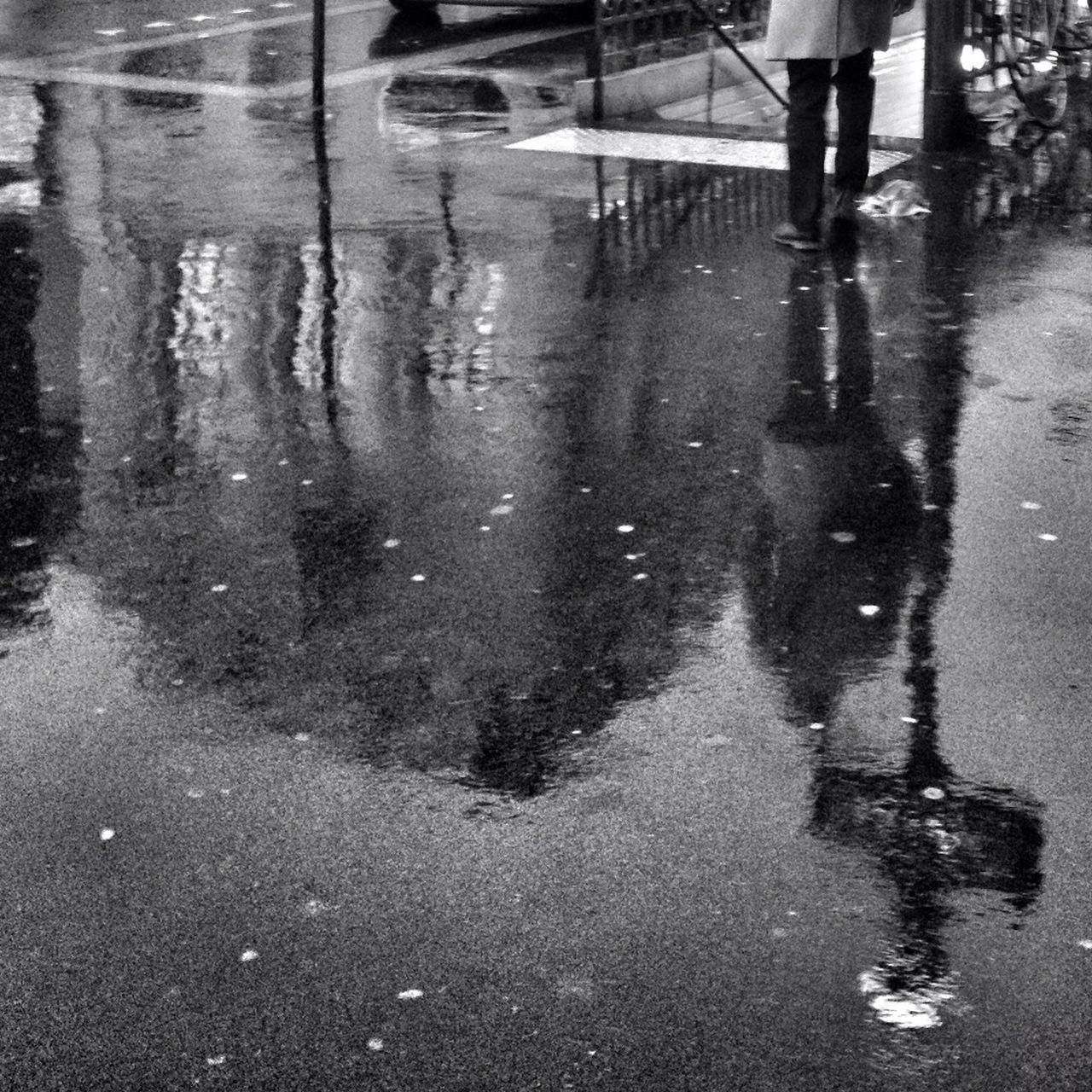 wet, water, rain, street, walking, reflection, puddle, low section, lifestyles, season, monsoon, weather, road, men, motion, leisure activity, rainy season, person