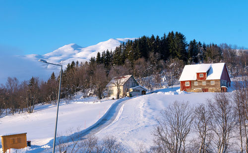 Scenic view of snow covered mountain against sky