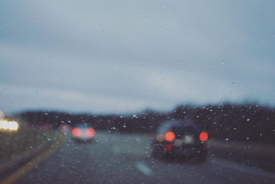 Road seen through car windshield