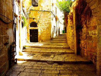 Narrow alley in front of building