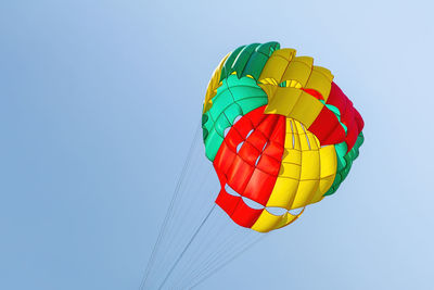 Low angle view of hot air balloon against clear sky