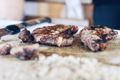 Close-up of meat on barbecue grill