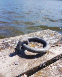 High angle view of rusty metal on shore