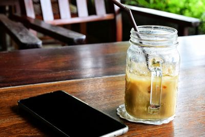 Close-up of drink in jar on table