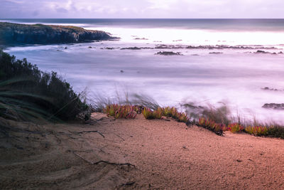 Scenic view of sea against sky during sunset