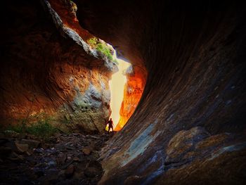 Man standing in cave