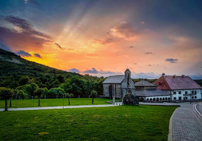 Scenic view of field against sky during sunset