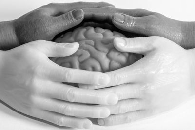 Close-up of hands holding ice cream