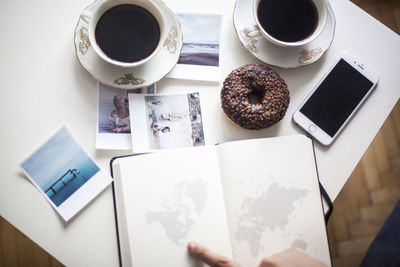 High angle view of coffee cup on table