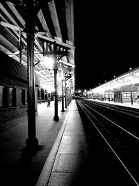 Railroad station platform at night