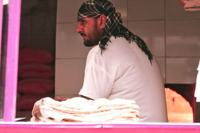 Midsection of man with ice cream