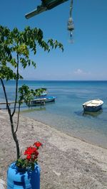 Scenic view of sea against cloudy sky