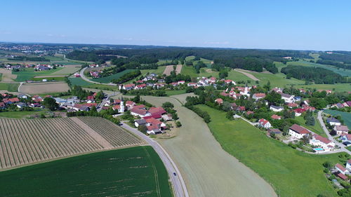 High angle view of agricultural field against clear sky