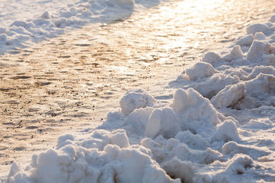 Scenic view of snow covered land