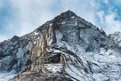 Scenic view of snowcapped mountain against sky