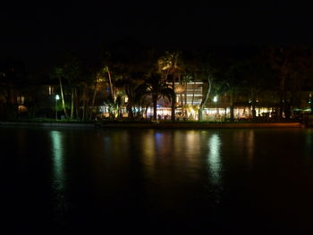 Reflection of illuminated buildings in water