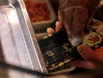 Midsection of person having food