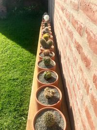 High angle view of stone wall on footpath