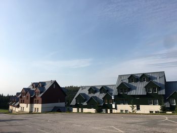 Buildings in city against sky