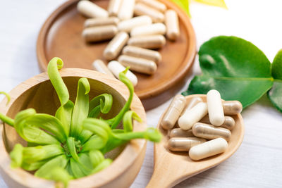 High angle view of vegetables in container on table