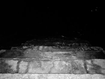 Stone wall at night