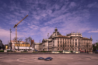 View of building against cloudy sky