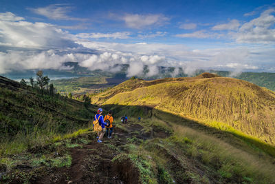 People on mountain in indonesia