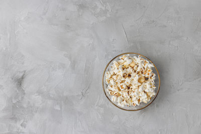 Popcorn in bowl. ingredient for cooking, copy space