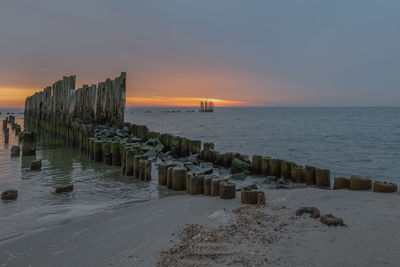 Scenic view of sea against sky during sunrise babie doly pland