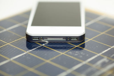 Close-up of smart phone on table