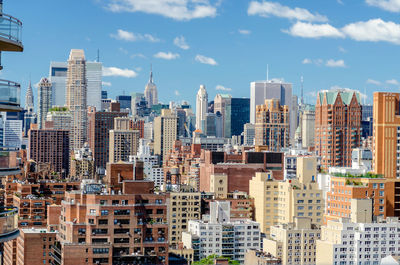 View of buildings in city against sky