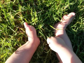 Low section of person legs on field