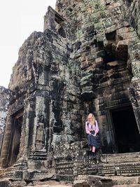 Full length of man outside temple against building