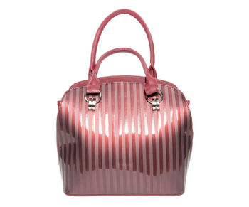 Close-up of pink object against white background