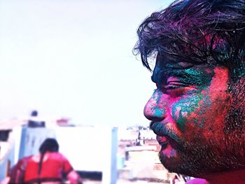 Close-up of man with powdered paint during holi