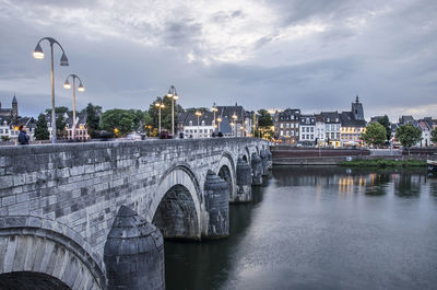 Riverfront in maastricht, the netherlands, during the blue hour