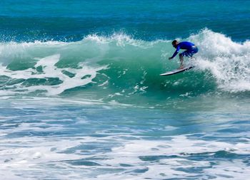 Man surfing in sea