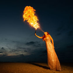 Fire breathing with donia serena on the beach