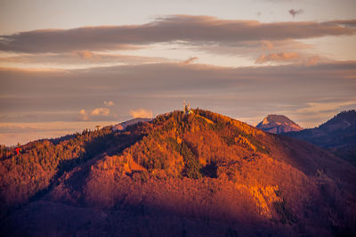 Scenic view of mountains against sky during sunset