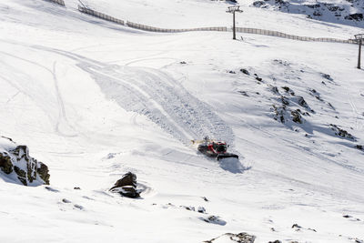 High angle view of snow covered field