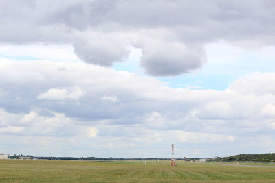 Scenic view of field against sky