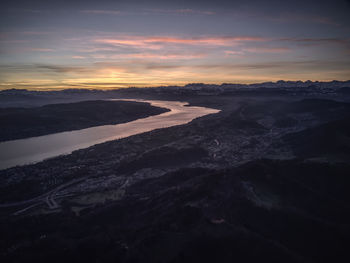 Scenic view of landscape against sky during sunset