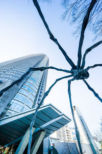 Low angle view of modern building against sky