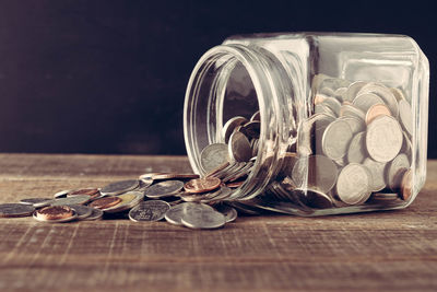 Close-up of coins on table
